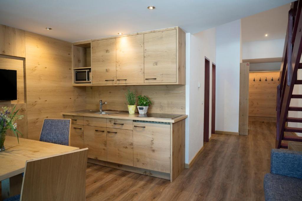 Kuchyň nebo kuchyňský kout v ubytování Aparthotel Schindlhaus und Koia Premium Apartments