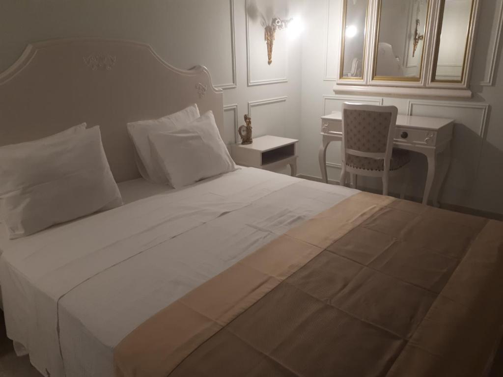 Postel nebo postele na pokoji v ubytování Alto Ver Rooms