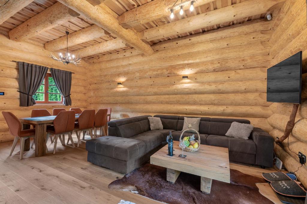 Posezení v ubytování Log House The River Pearl