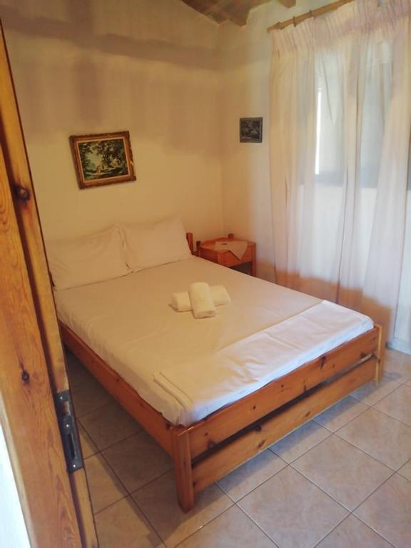 Postel nebo postele na pokoji v ubytování Kastraki Villas