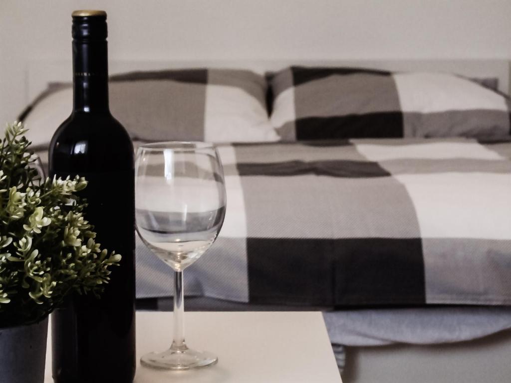 Postel nebo postele na pokoji v ubytování Anita Apartman
