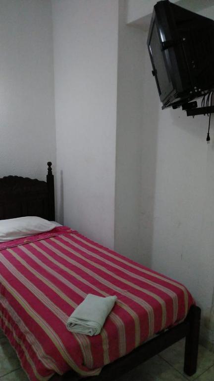 Una cama o camas en una habitación de Hotel Atlântico Avenida