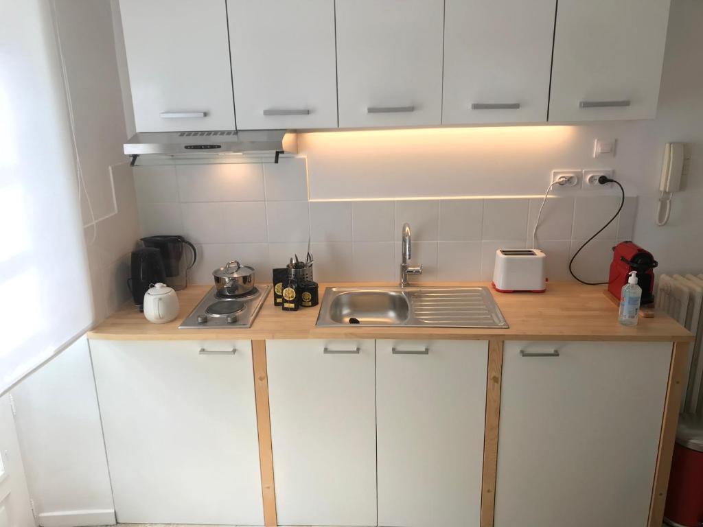 Kuchyň nebo kuchyňský kout v ubytování Maison d'hôtes de Charme