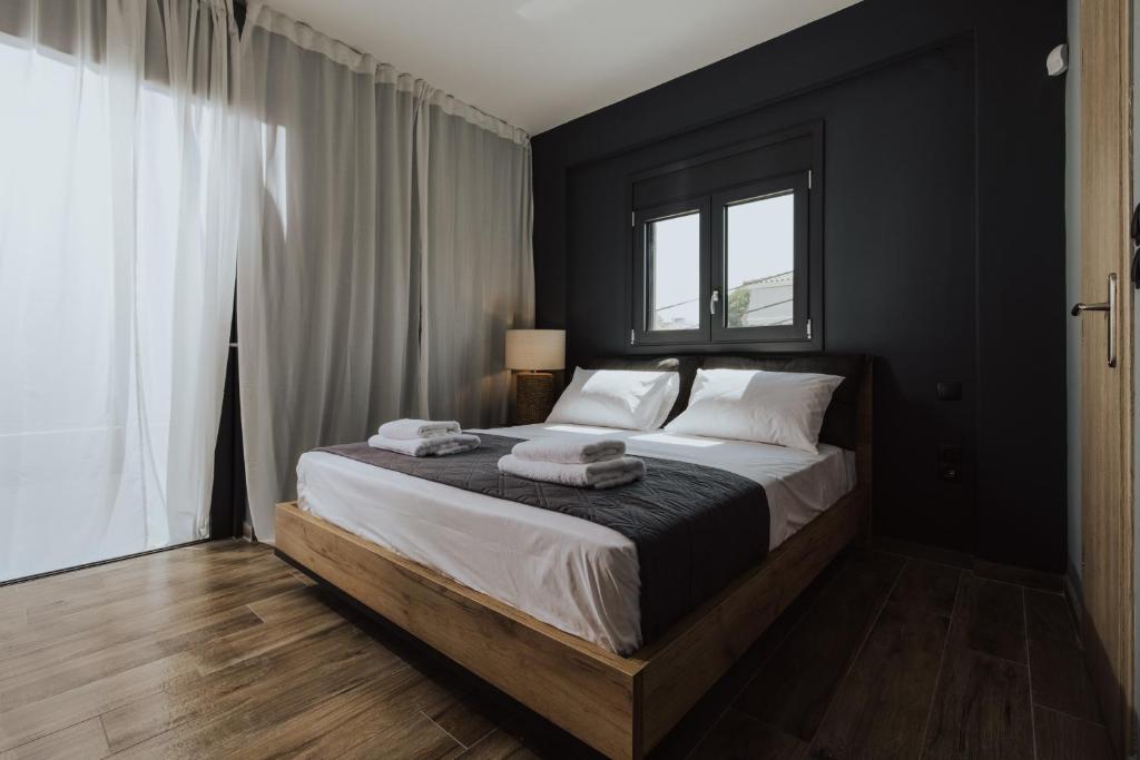 Postel nebo postele na pokoji v ubytování YaMa Villas