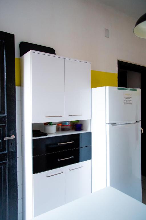 Kuchyň nebo kuchyňský kout v ubytování NeighborHUB hostel e coliving