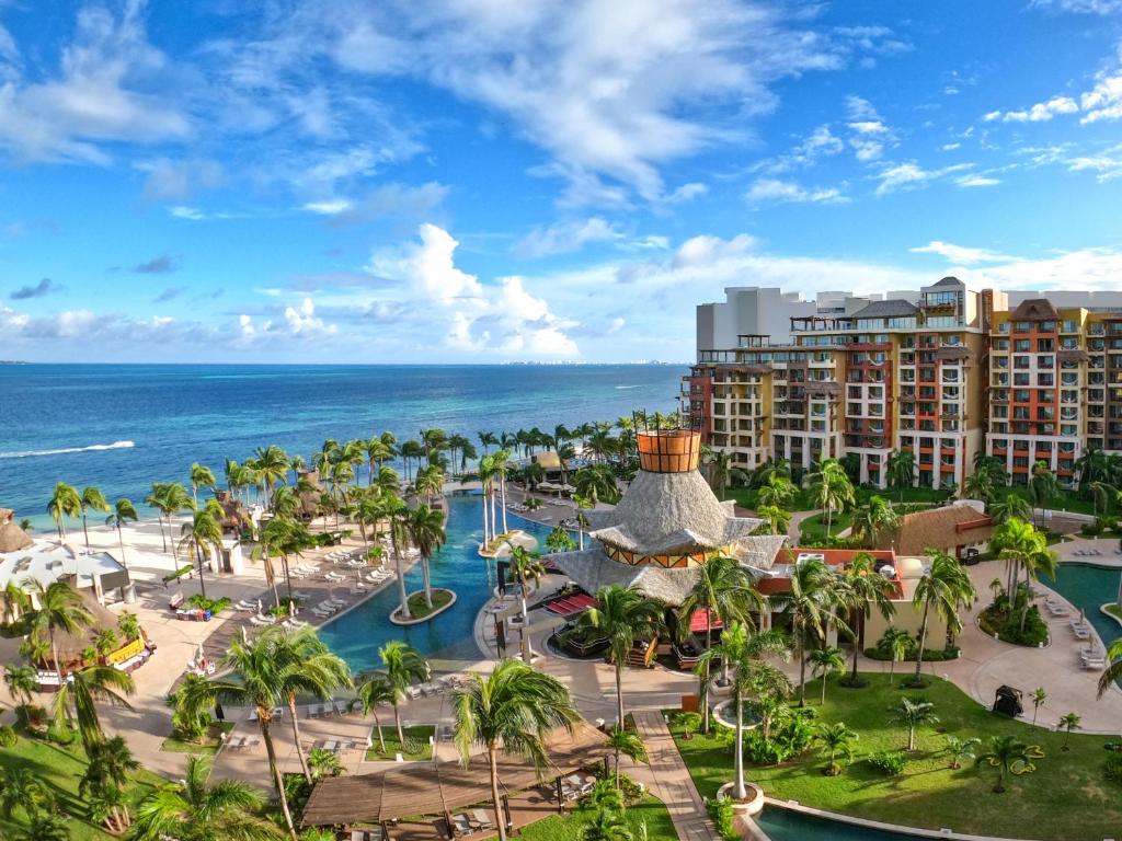 an aerial view of the resort and the ocean at Villa del Palmar Cancun Luxury Beach Resort & Spa in Cancún
