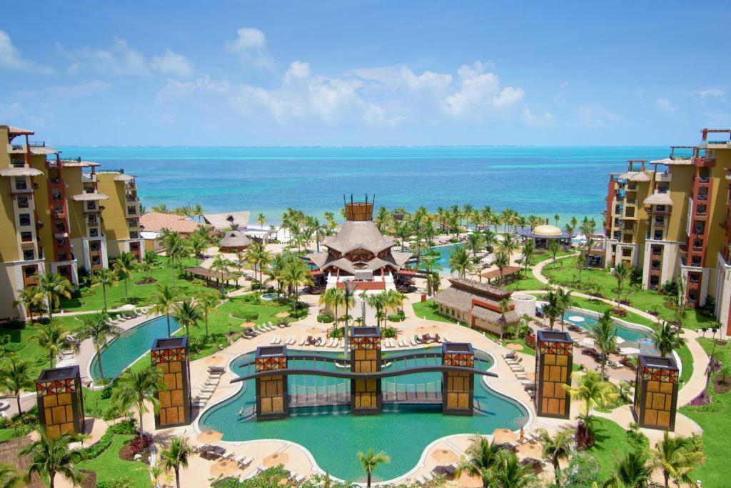 an aerial view of the resort with the ocean in the background at Villa del Palmar Cancun Luxury Beach Resort & Spa in Cancún
