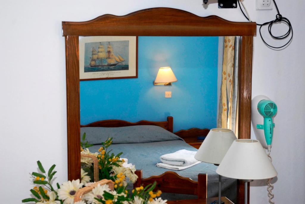 Cama o camas de una habitación en Amaryllis Hotel