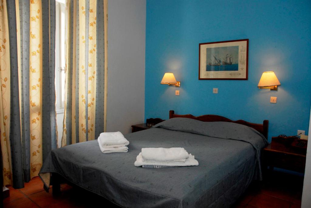 Cama o camas de una habitación en Amaryllis Hotel