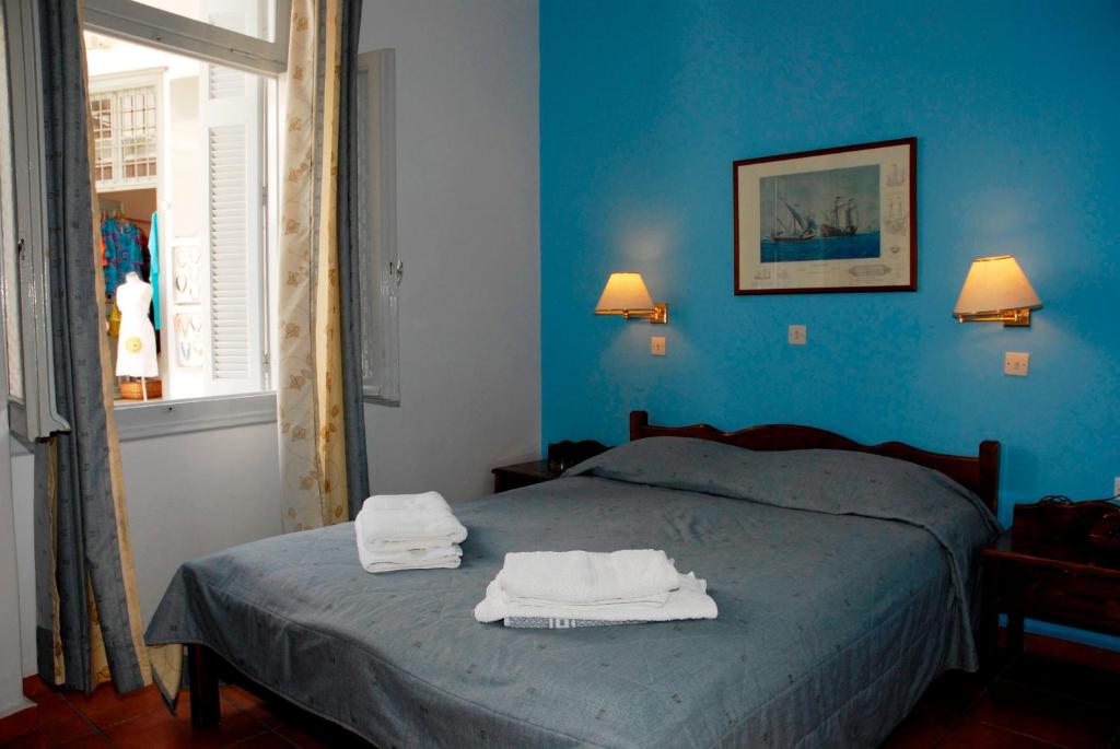 Cama o camas de una habitación en Amaryllis Hotel