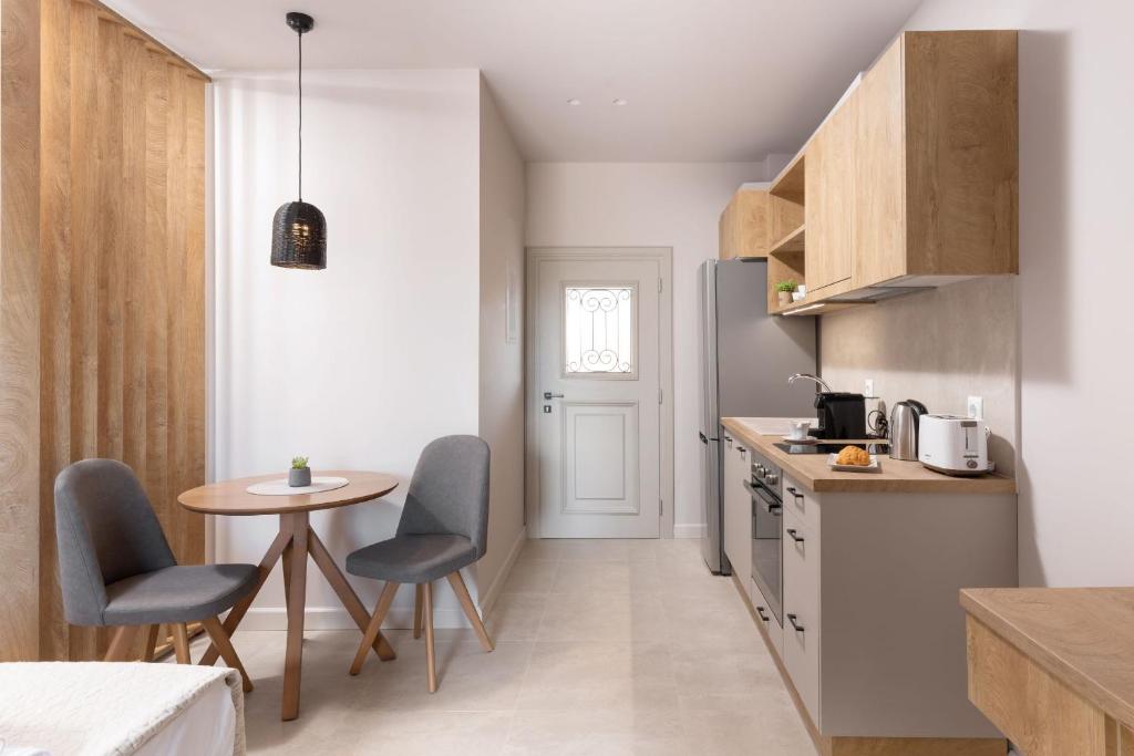 A cozinha ou kitchenette de Onore Luxury Suites
