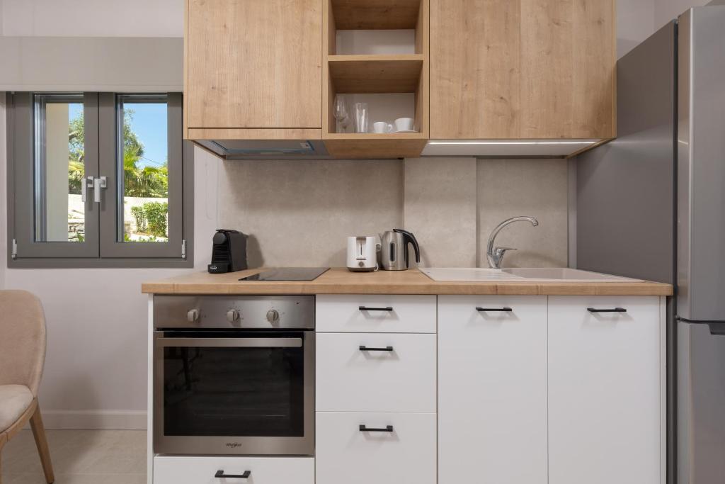 A cozinha ou kitchenette de Onore Luxury Suites