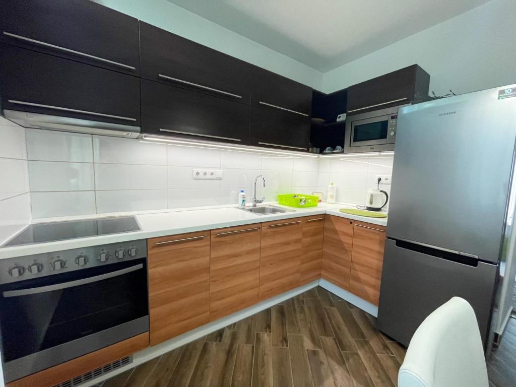 Kuchnia lub aneks kuchenny w obiekcie Greatforest Rosehill 1 Apartman