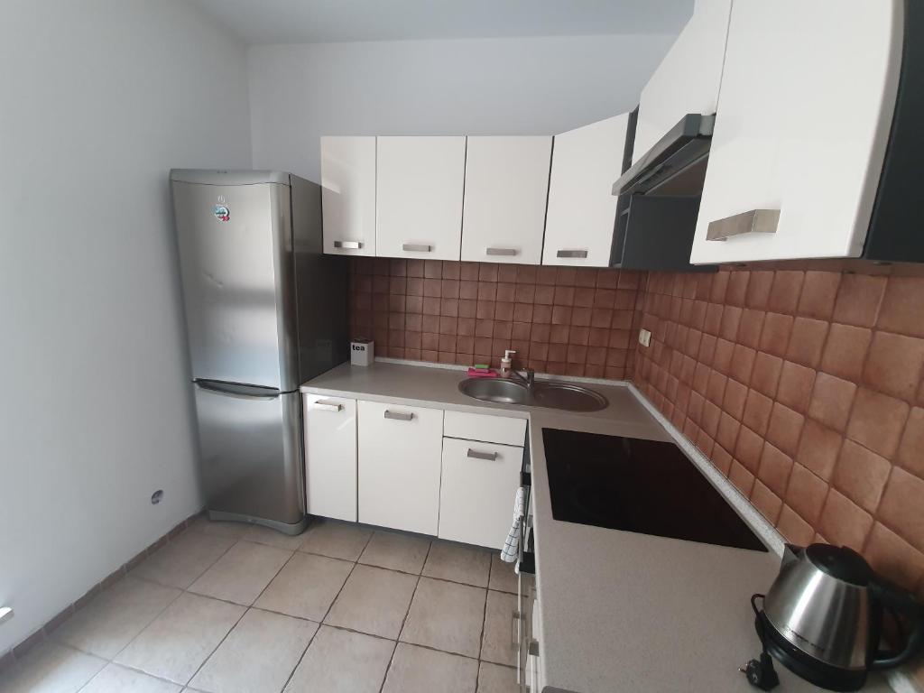 Kuchyňa alebo kuchynka v ubytovaní Senator Warsaw Apartments
