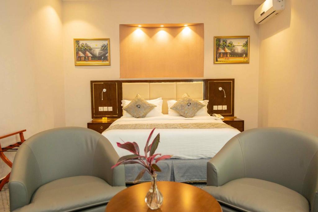 Postel nebo postele na pokoji v ubytování Cap Kivu Hôtel