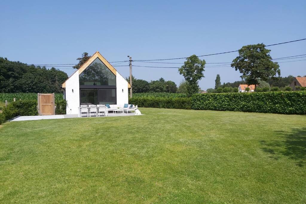 Zahrada ubytování Vakantiewoning Hélence