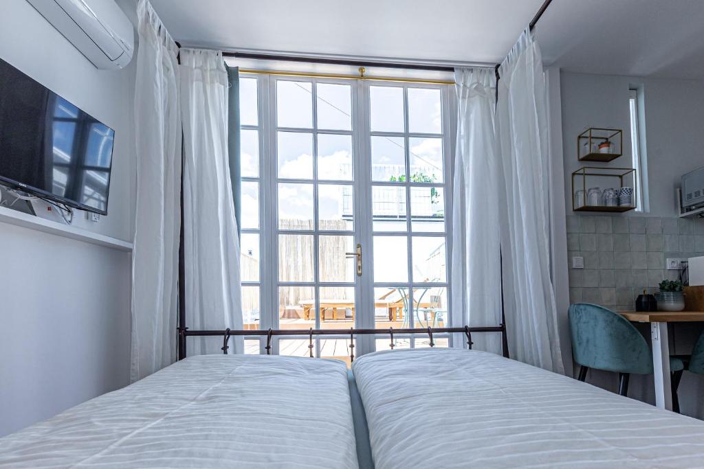 Posteľ alebo postele v izbe v ubytovaní d&v living
