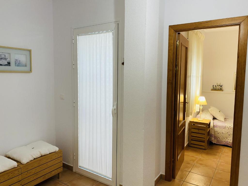 Posteľ alebo postele v izbe v ubytovaní Apartamento Conil Santa Clara