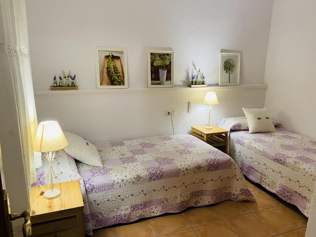 Posteľ alebo postele v izbe v ubytovaní Apartamento Conil Santa Clara