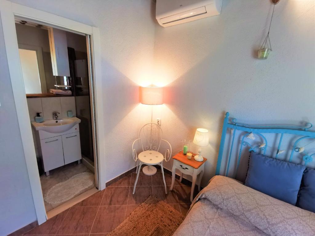 Kuchyň nebo kuchyňský kout v ubytování Villa Kućica