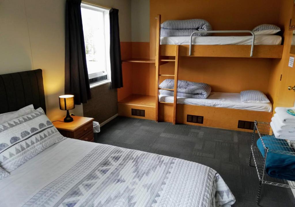 Postel nebo postele na pokoji v ubytování Zula Lodge