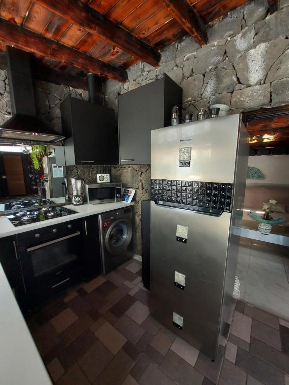 Kuchyň nebo kuchyňský kout v ubytování ALOELUX VILLA ! - Private Villa with Jacuzzi, cinema ,massage ,wonderful view, art desing villa