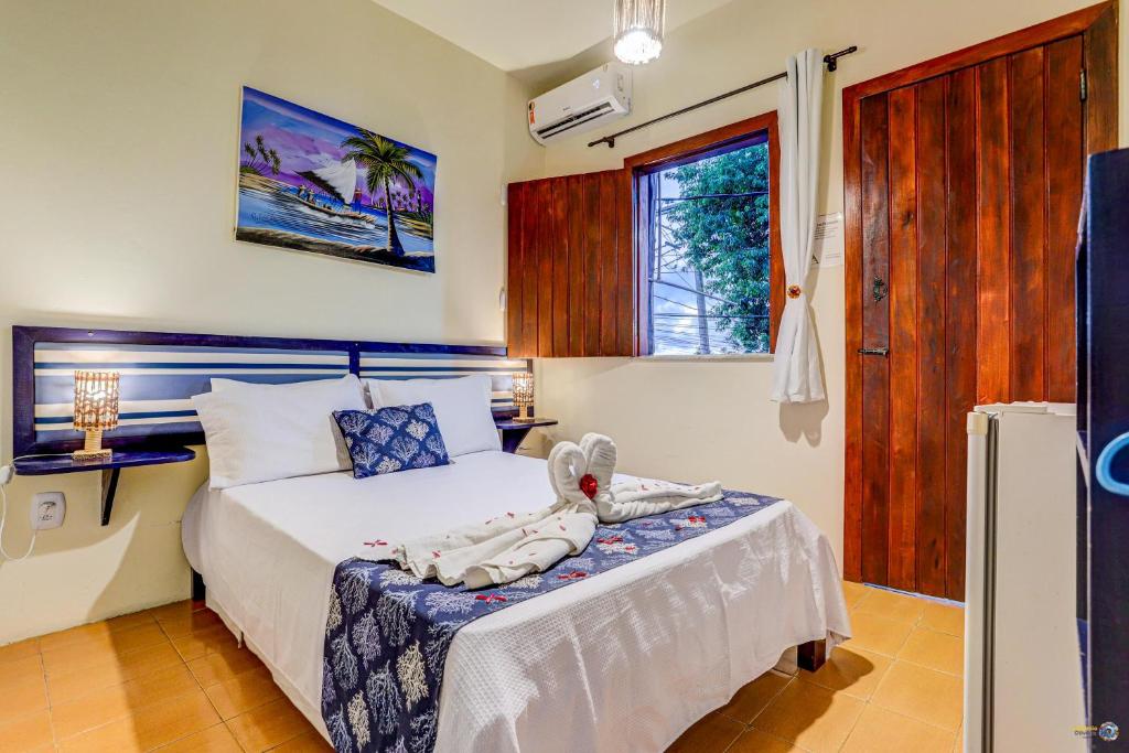Cama ou camas em um quarto em Pousada Galeão Itacaré