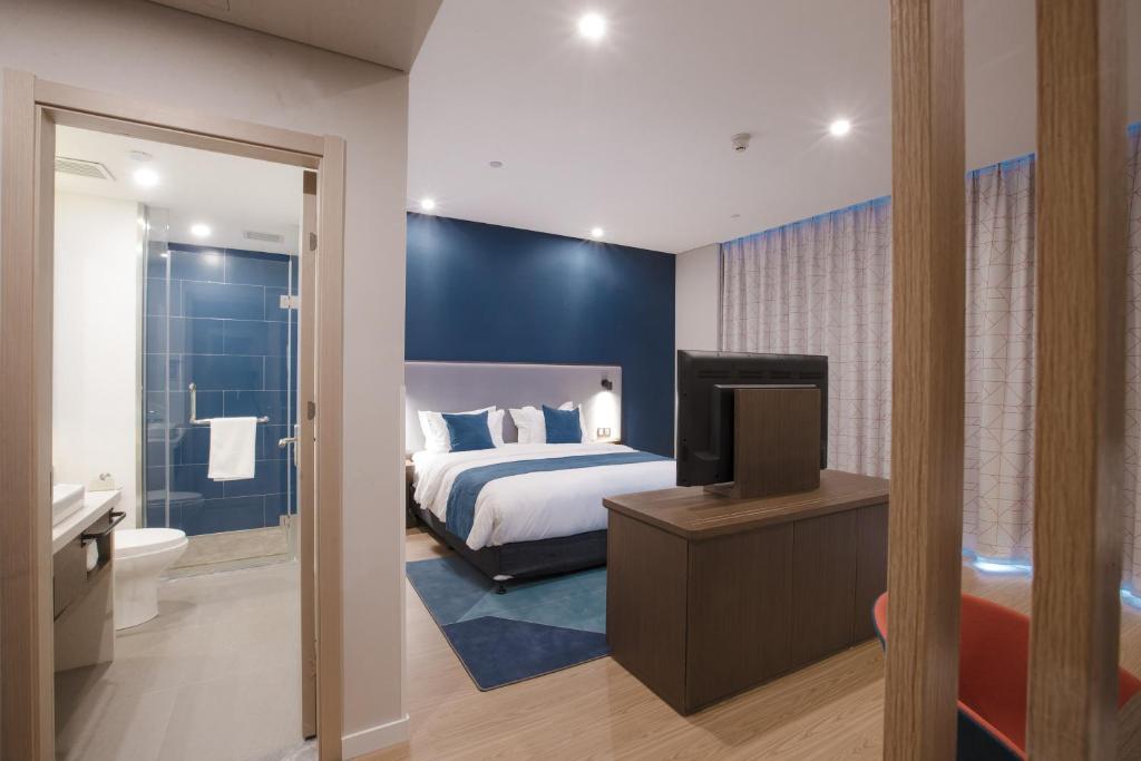 Postel nebo postele na pokoji v ubytování Holiday Inn Express Hefei High Tech by IHG