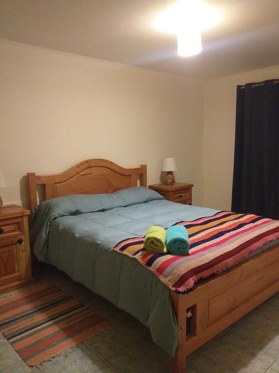 Postel nebo postele na pokoji v ubytování Hostal Ayni