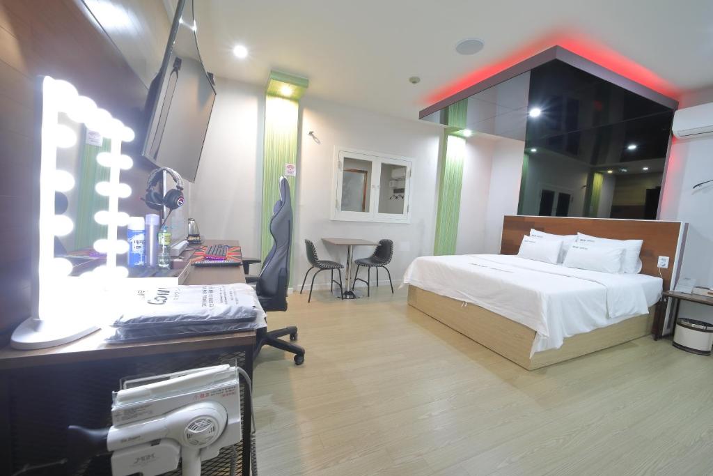 Postel nebo postele na pokoji v ubytování HOTEL ViA