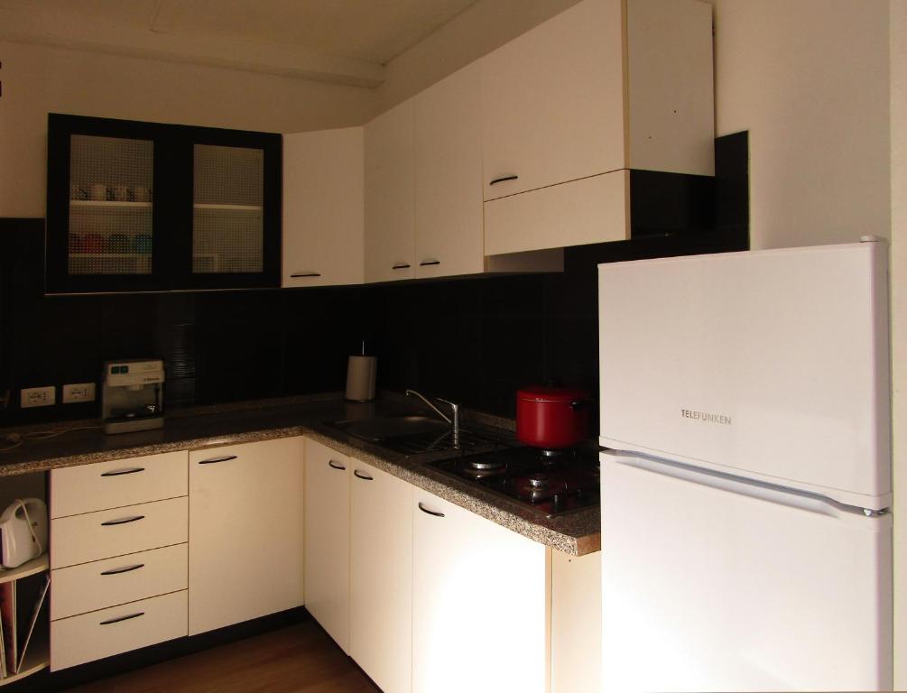 Kuchyň nebo kuchyňský kout v ubytování Residenza Torre Antica
