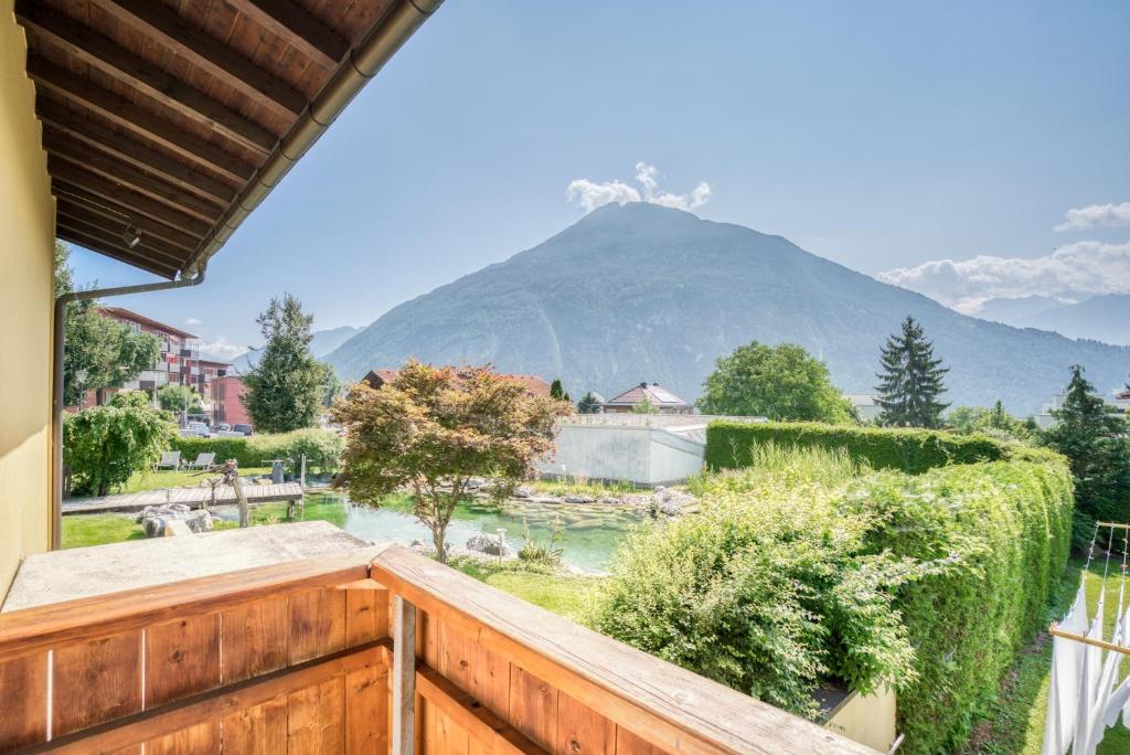 a balcony with a view of a mountain at Pension Weirather in Imst