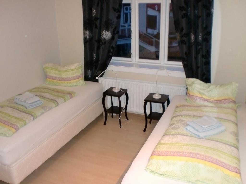 Postel nebo postele na pokoji v ubytování Guesthouse Tilraun