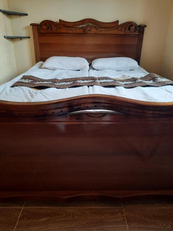 Postel nebo postele na pokoji v ubytování Family