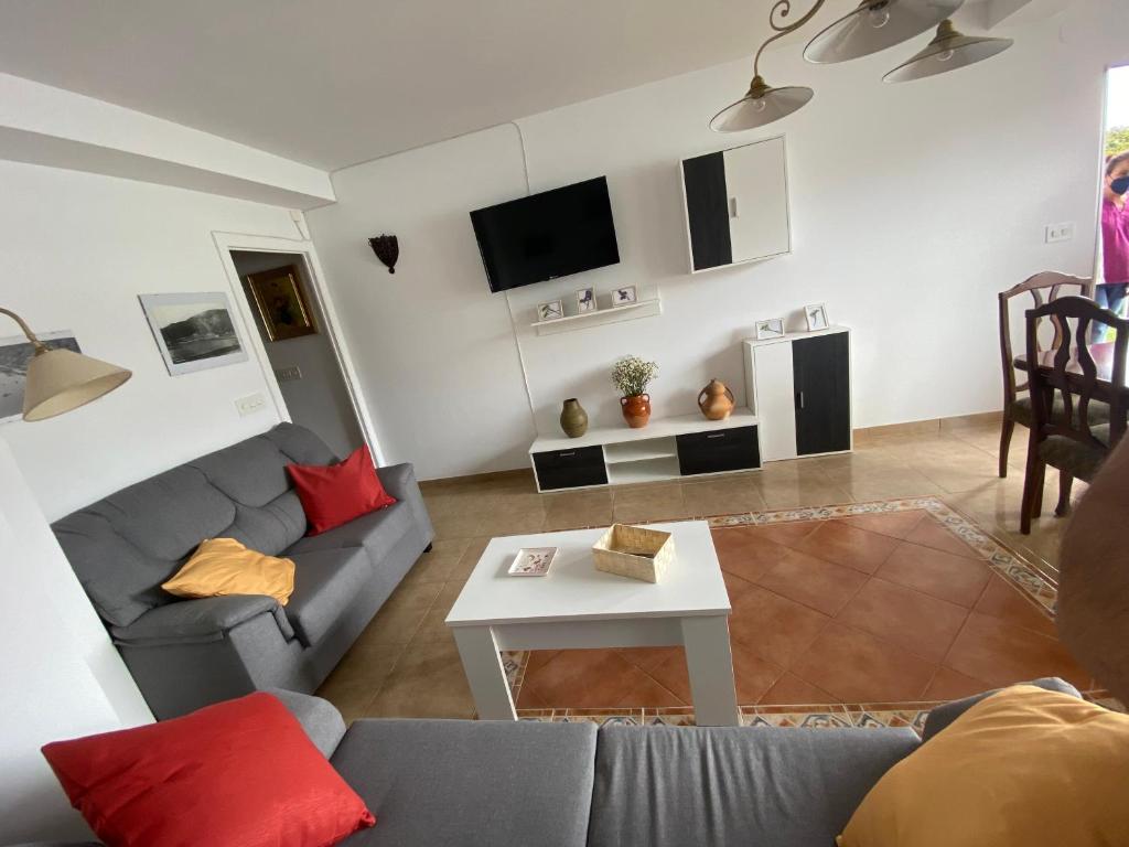 Televízia a/alebo spoločenská miestnosť v ubytovaní Apartamento céntrico con vistas y cerca de playa
