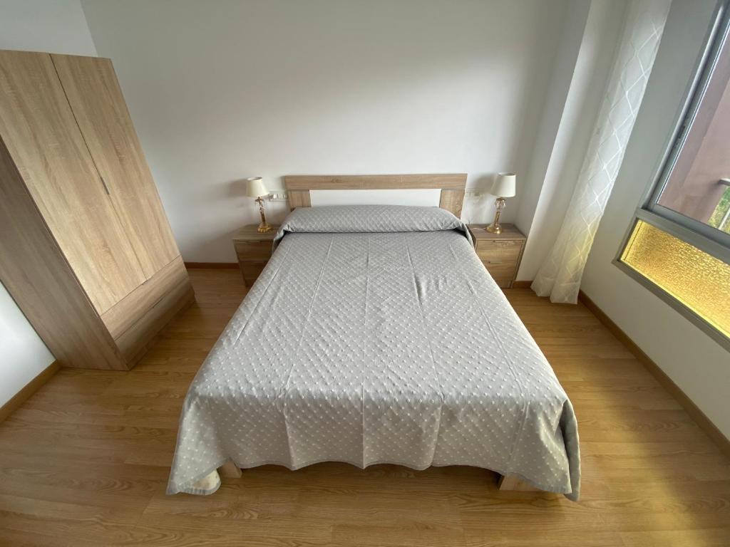 Posteľ alebo postele v izbe v ubytovaní Apartamento céntrico con vistas y cerca de playa