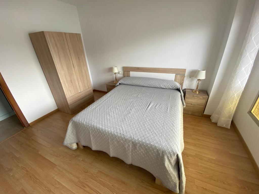 Posteľ alebo postele v izbe v ubytovaní Apartamento céntrico con vistas y cerca de playa