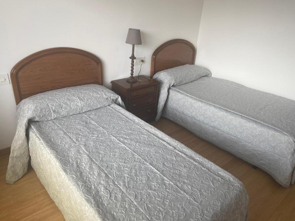 Posteľ alebo postele v izbe v ubytovaní Apartamento céntrico con vistas y cerca de playa
