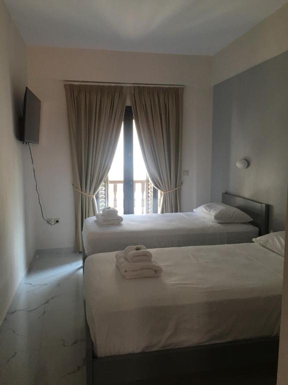 Voodi või voodid majutusasutuse Augusta Methoni Hotel toas