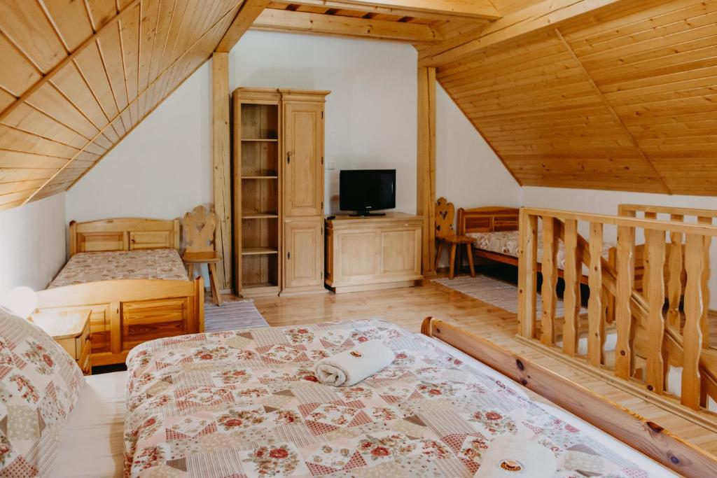 Postel nebo postele na pokoji v ubytování Penzion Sindlovec