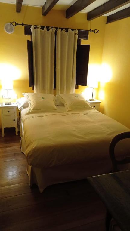 A bed or beds in a room at Posada Reserva Verde