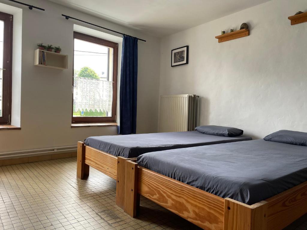 Postel nebo postele na pokoji v ubytování Gîte La Semois