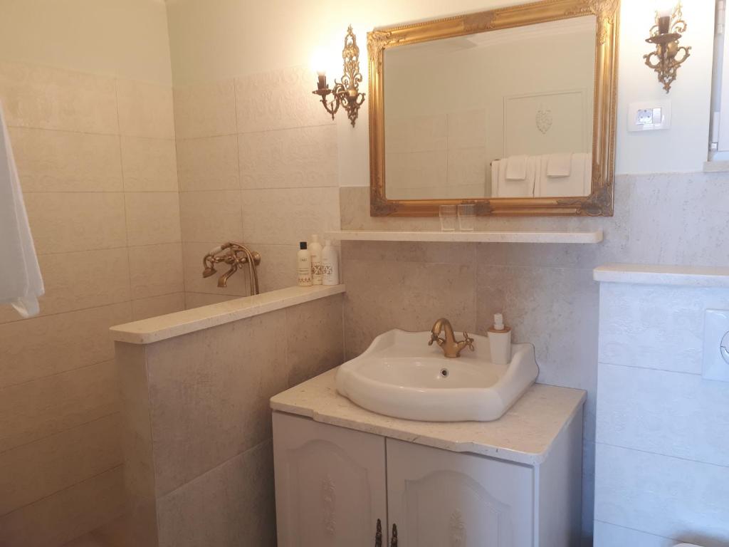 Koupelna v ubytování Alto Ver Rooms