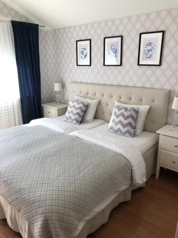 Voodi või voodid majutusasutuse Nautic Hotell toas
