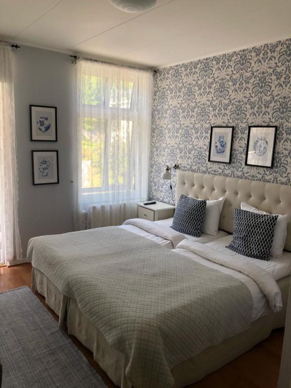 Voodi või voodid majutusasutuse Nautic Hotell toas