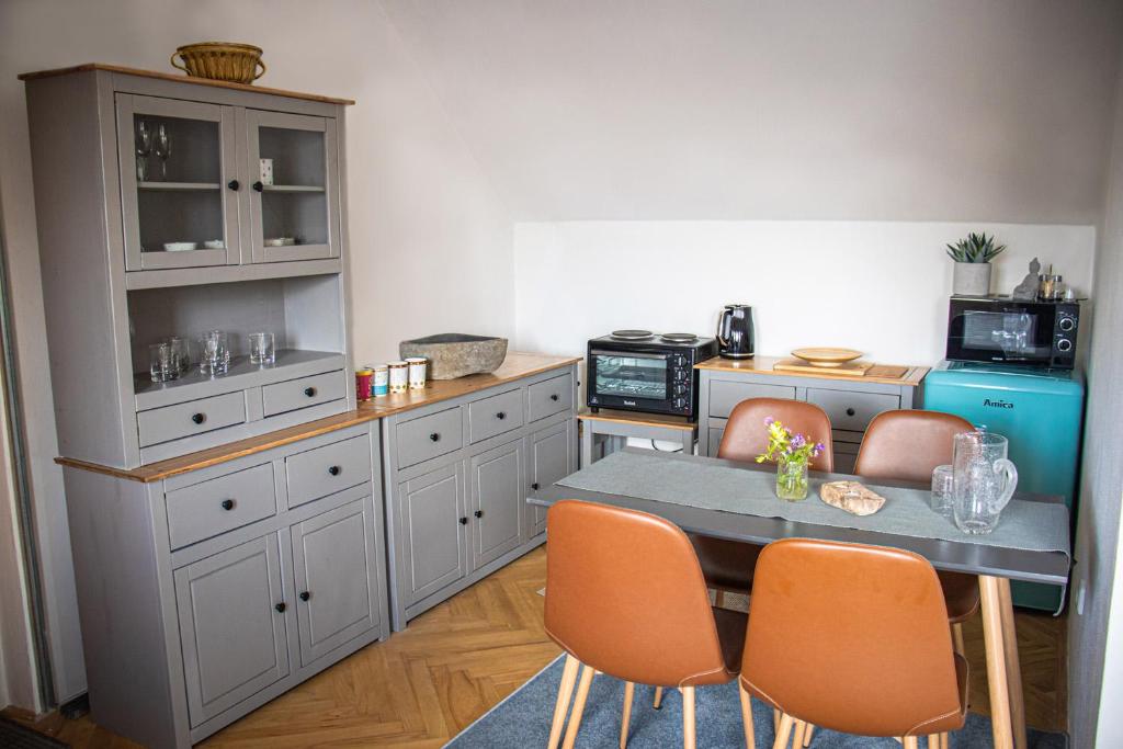 Kuchyň nebo kuchyňský kout v ubytování Apartmány u Petry