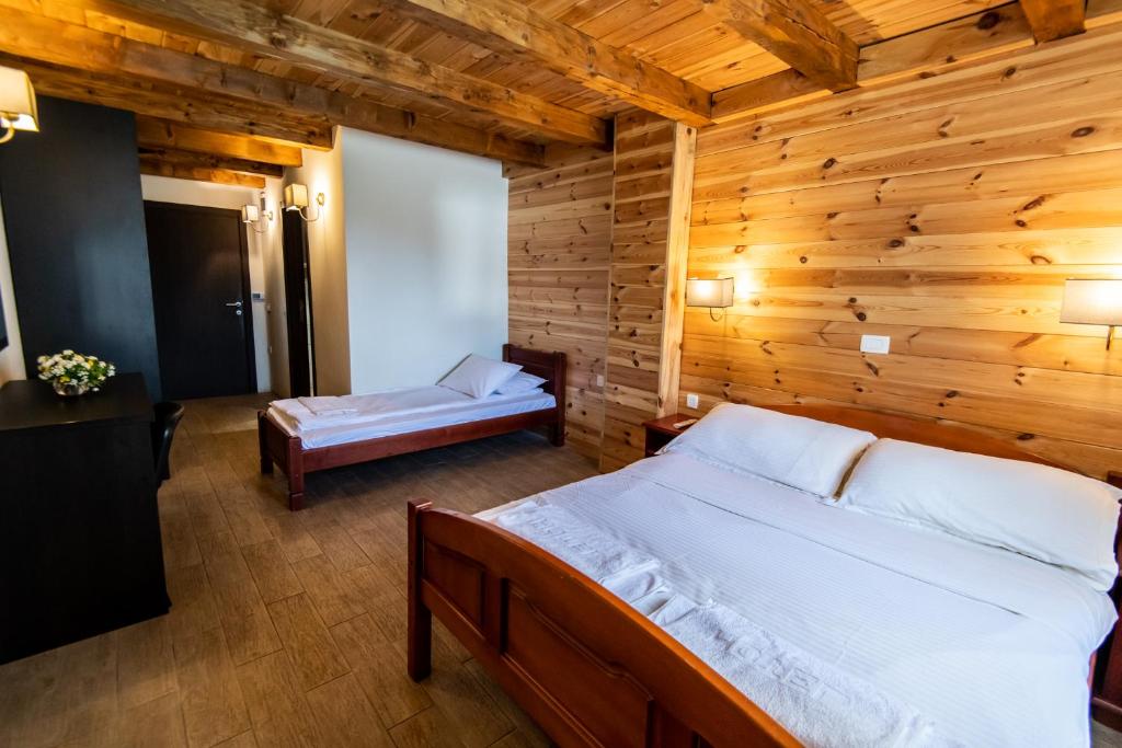 Postel nebo postele na pokoji v ubytování Hotel Enigma