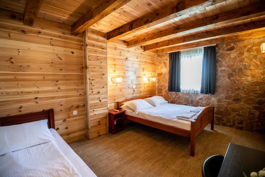 Postel nebo postele na pokoji v ubytování Hotel Enigma