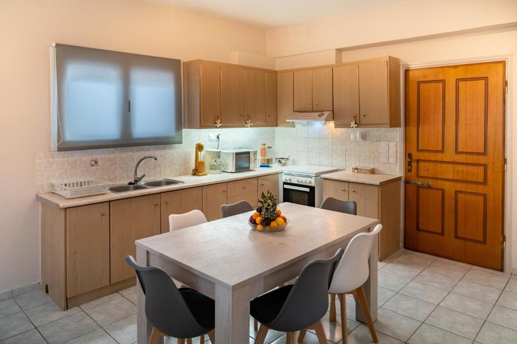 Kuchnia lub aneks kuchenny w obiekcie Artemis apartment
