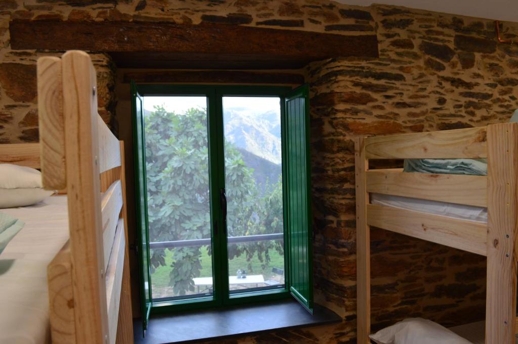 Postel nebo postele na pokoji v ubytování Eco dos Teixos